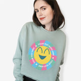 Graphic sweatshirt cropped in green with smiley face and personalised text.