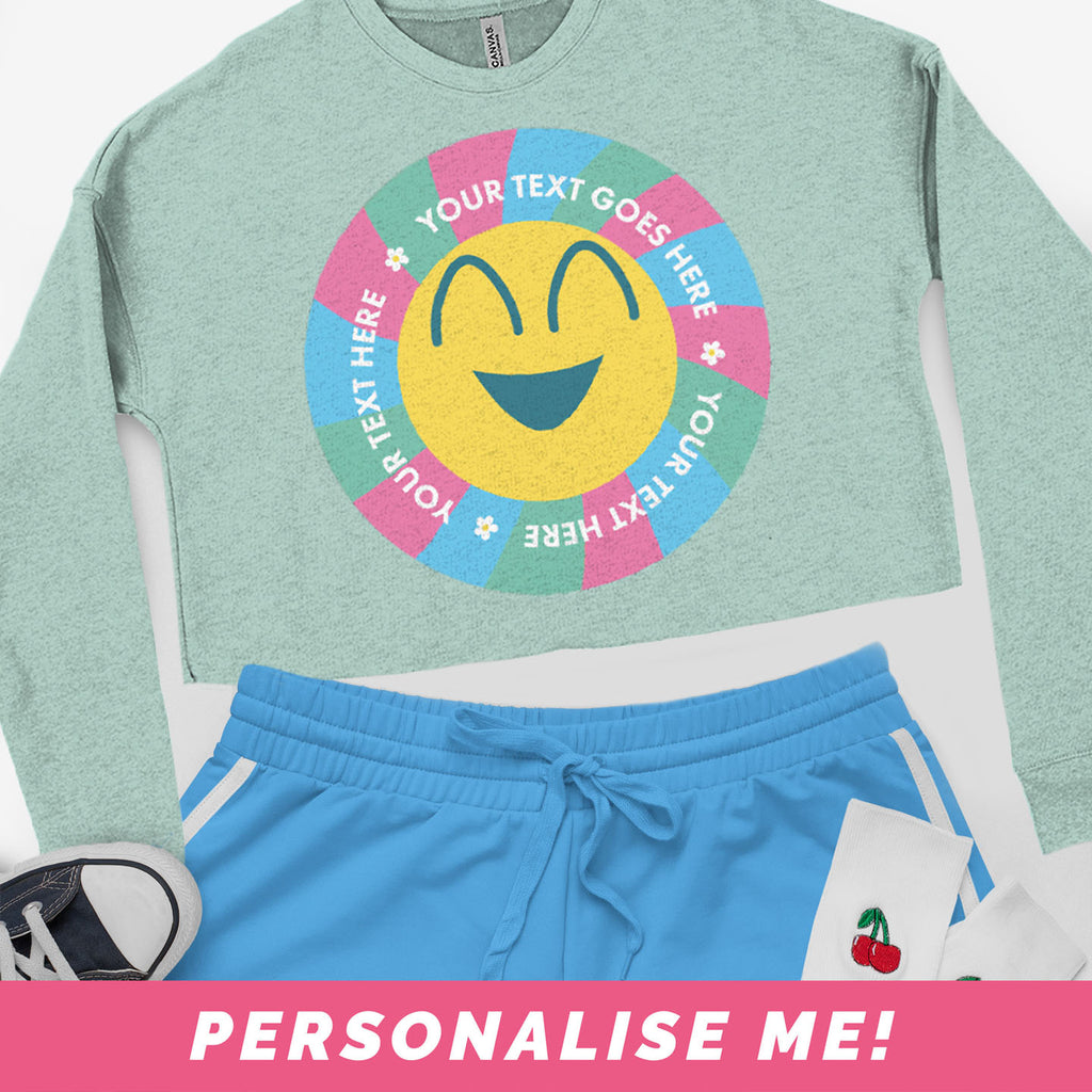 Graphic sweatshirt cropped - personalised text with a smiley face design.