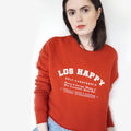 Cropped sweatshirt in red with slogan - different angle.