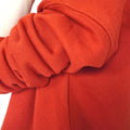 Close of the sleeve - it's plain red.